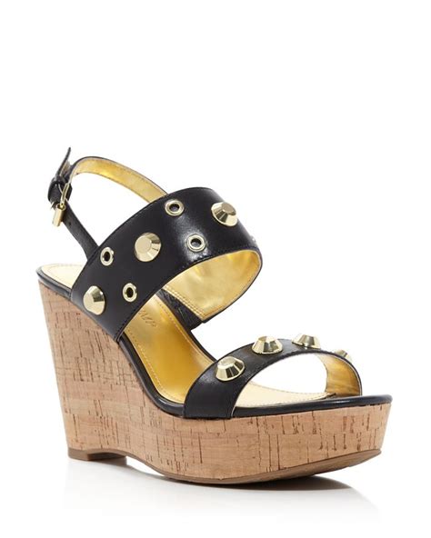 IVANKA TRUMP Gitty Grommet Platform Wedge .